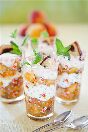 simsearch:6126-08642990,k - Sweden, Peach compote trifle with lemon cream Stock Photo - Premium Royalty-Free, Code: 6126-08643006