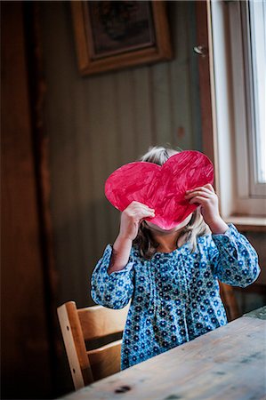 simsearch:6126-09102554,k - Sweden, Girl (2-3) holding paper heart in front of face Stock Photo - Premium Royalty-Free, Code: 6126-08643161