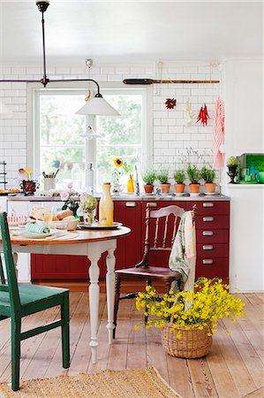 Sweden, Interior of kitchen with dining table Stock Photo - Premium Royalty-Free, Code: 6126-08643136