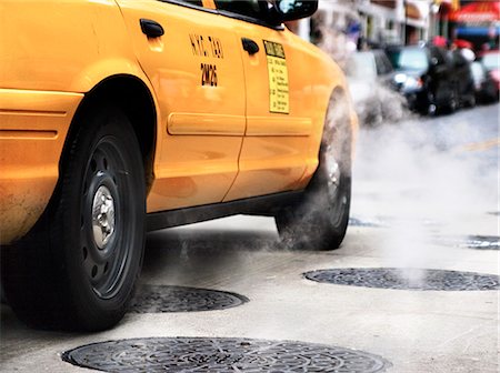 USA, New York State, New York City, Manhattan, Yellow taxi in traffic jam Stock Photo - Premium Royalty-Free, Code: 6126-08643235