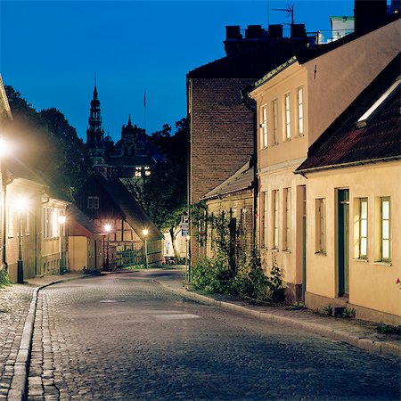 european cobbled street - Sweden, Skane, Lund, Street of town at autumn night Stock Photo - Premium Royalty-Free, Code: 6126-08643421