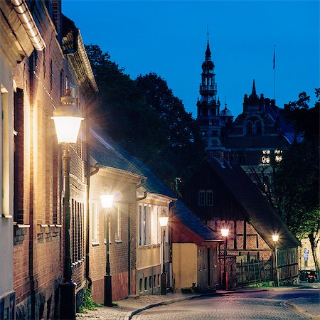 Sweden, Skane, Lund, Street of town at autumn night Foto de stock - Sin royalties Premium, Código: 6126-08643422