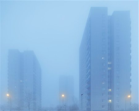 simsearch:6126-08643421,k - Sweden, Skane, Malmo, Hogaholm, Almvik, Residential buildings in fog Stock Photo - Premium Royalty-Free, Code: 6126-08643589