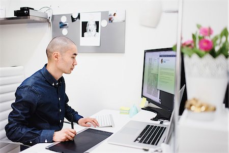 Sweden, Freelancer working at office Stock Photo - Premium Royalty-Free, Code: 6126-08644041