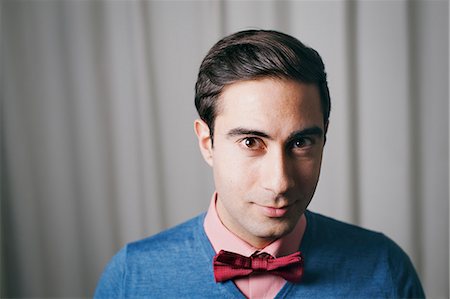 simsearch:6126-08644046,k - Sweden, Portrait of man wearing bow tie Stock Photo - Premium Royalty-Free, Code: 6126-08644038