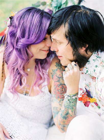 Sweden, Bride with purple hair and groom at hippie wedding Stock Photo - Premium Royalty-Free, Image code: 6126-08644287