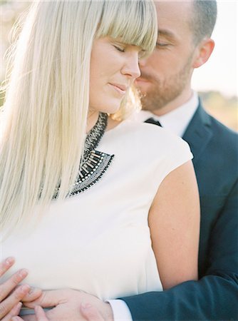 Sweden, Groom embracing bride Stock Photo - Premium Royalty-Free, Code: 6126-08644299