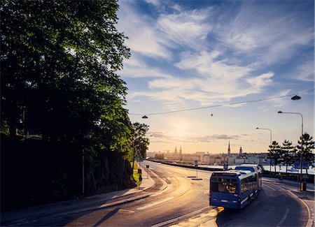 sonneneruption - Sweden, Stockholm, Sodermalm, Bus in morning light Stockbilder - Premium RF Lizenzfrei, Bildnummer: 6126-08644480