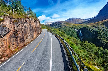 Norway, More og Romsdal, Sunnmore, View of road in mountainous landscape Stock Photo - Premium Royalty-Free, Code: 6126-08644431