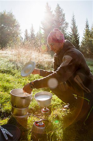 Sweden, Medelpad, Sundsvall, Mid adult man cooking soup Stock Photo - Premium Royalty-Free, Code: 6126-08658913