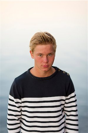 Sweden, Ostergotland, Portrait of teenage boy (16-17) Stock Photo - Premium Royalty-Free, Code: 6126-08659052