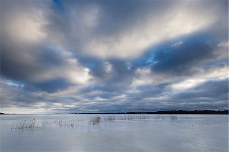 simsearch:6126-08635626,k - Sweden, Sodermanland, Clouds on sky over lake Foto de stock - Royalty Free Premium, Número: 6126-08659071