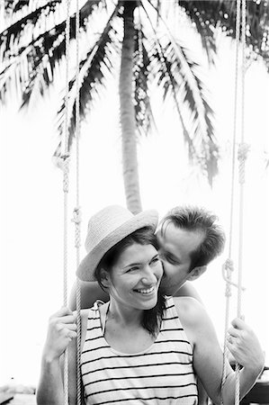 simsearch:400-05097844,k - Thailand, Koh Tao, Young couple on swing Stock Photo - Premium Royalty-Free, Code: 6126-08659140