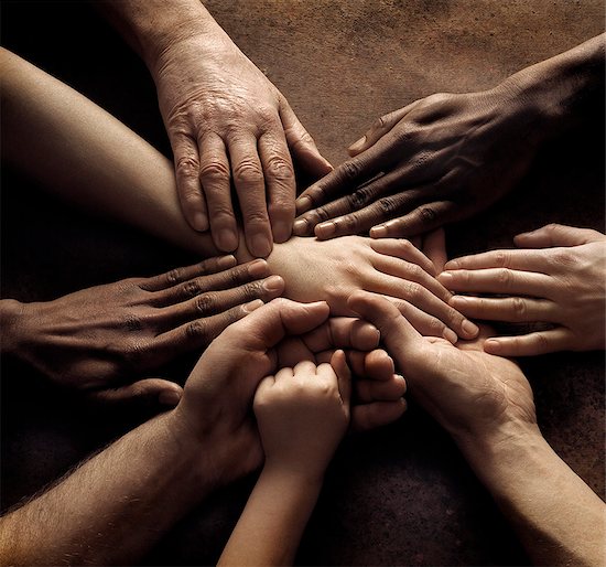 Close-up of people's hands holding together Stock Photo - Premium Royalty-Free, Image code: 6126-08659443