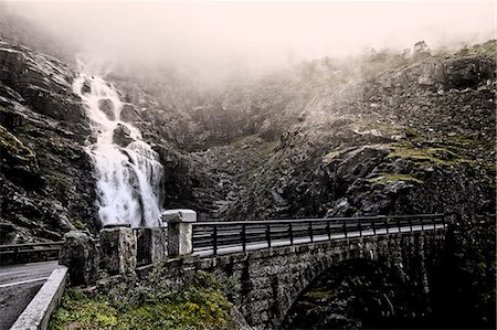 Norway, Vastlandet, More og Romsdal, Trollstigen, Bridge next to waterfall Stock Photo - Premium Royalty-Free, Code: 6126-08659434