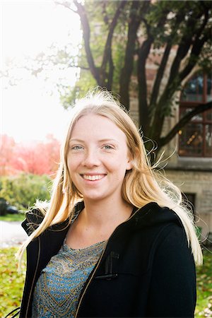 swedish - Sweden, Vastra Gotaland, Gothenburg, School of Business, Economics and Law, Portrait of young woman standing by university Stock Photo - Premium Royalty-Free, Code: 6126-08635482