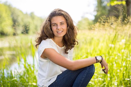 simsearch:6126-08658998,k - Sweden, Ostergotland, Mjolby, Smiling teenage girl (14-15) Stock Photo - Premium Royalty-Free, Code: 6126-08635576