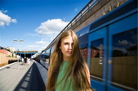 simsearch:693-06018584,k - Sweden, Stockholm, Portrait of teenage girl (16-17) on platform Photographie de stock - Premium Libres de Droits, Code: 6126-08635509