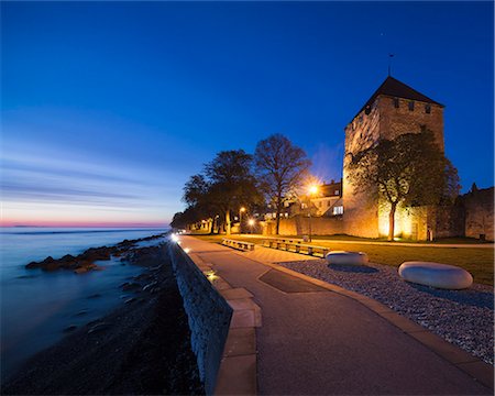 Sweden, Gotland, Visby, Illuminated promenade at dusk Stock Photo - Premium Royalty-Free, Code: 6126-08635778