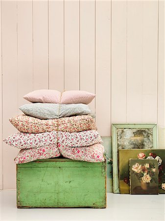 Close up of pillows, dresser and paintings in country home Stock Photo - Premium Royalty-Free, Code: 6126-08635948