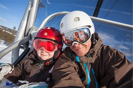 simsearch:6126-08636742,k - Norway, Osterdalen, Trysil, Portrait of girl (4-5) and her father taking ski lift Stock Photo - Premium Royalty-Free, Code: 6126-08636007