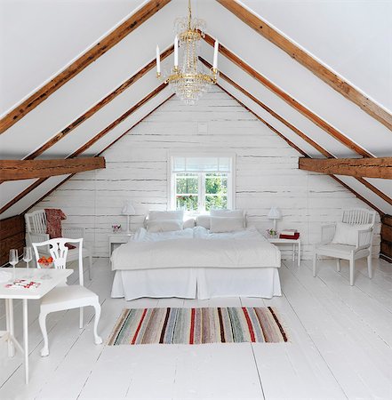 rustic bedroom - Sweden, Attic bedroom in rustic style Stock Photo - Premium Royalty-Free, Code: 6126-08636232
