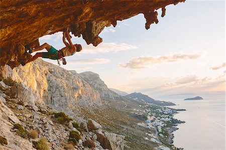 Greece, Dodecanese, Kalymnos, Rock climber on steep cliff Stock Photo - Premium Royalty-Free, Code: 6126-08636729