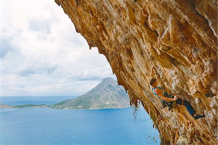 Greece, Dodecanese, Kalymnos, Rock climber on steep cliff Foto de stock - Sin royalties Premium, Código: 6126-08636731