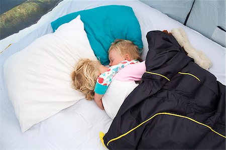 Sweden, Two sisters (2-3, 4-5) sleeping in tent Stock Photo - Premium Royalty-Free, Code: 6126-08781089