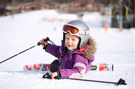 simsearch:6126-09267172,k - A young girl fallen off her skis Stock Photo - Premium Royalty-Free, Code: 6126-09102345