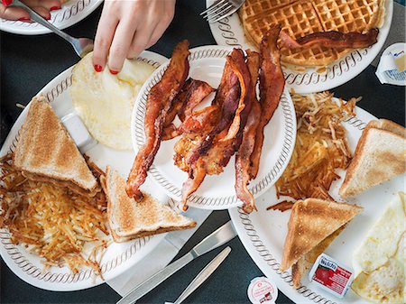 simsearch:649-08562947,k - Breakfast with bacon, toast, and waffles Stock Photo - Premium Royalty-Free, Code: 6126-09102508