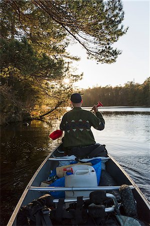 Rear view of man kayaking in Blekinge, Sweden Stock Photo - Premium Royalty-Free, Code: 6126-09102828