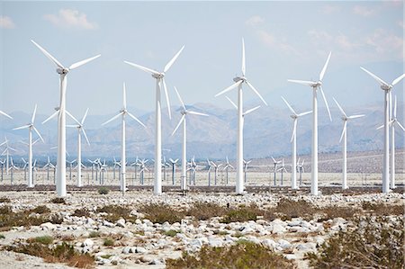 simsearch:400-04509158,k - Wind turbines against mountain landscape at Palm Desert Foto de stock - Sin royalties Premium, Código: 6126-09102930