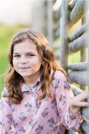 preteen girl redhead - Portrait of smiling girl Stock Photo - Premium Royalty-Free, Code: 6126-09103094