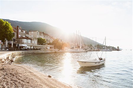 A boat anchored in a harbour in Croatia Stock Photo - Premium Royalty-Free, Code: 6126-09103178