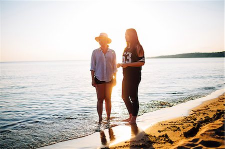 sandy lake - Two women on the beach Stock Photo - Premium Royalty-Free, Code: 6126-09103701