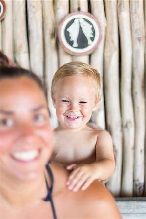 diani beach - Son behind his mother Stock Photo - Premium Royalty-Free, Code: 6126-09103897