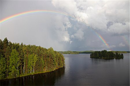 finnish - Rainbow over forest and lake Photographie de stock - Premium Libres de Droits, Code: 6126-09104144
