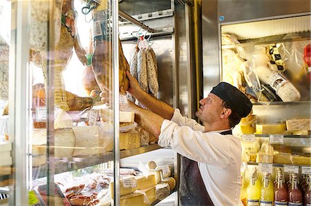 dairy store - Man working in food store Stock Photo - Premium Royalty-Free, Code: 6126-09104283