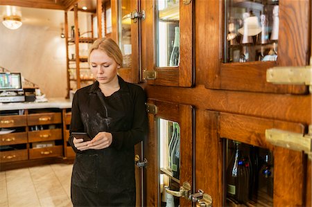 simsearch:6126-09104476,k - Baker on phone in bakery in Sweden Stock Photo - Premium Royalty-Free, Code: 6126-09104491