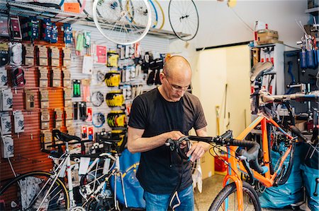Small business owner of bicycle store Stock Photo - Premium Royalty-Free, Code: 6126-09104503
