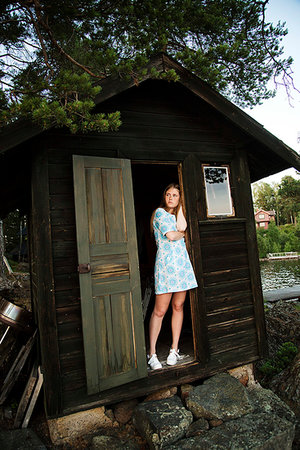 simsearch:6126-08635483,k - Young woman in summerhouse in Dalarna, Sweden Stock Photo - Premium Royalty-Free, Code: 6126-09266490