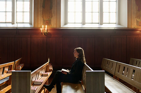 sitting in pews - Priest with bible sitting on church pew Stock Photo - Premium Royalty-Free, Code: 6126-09268172