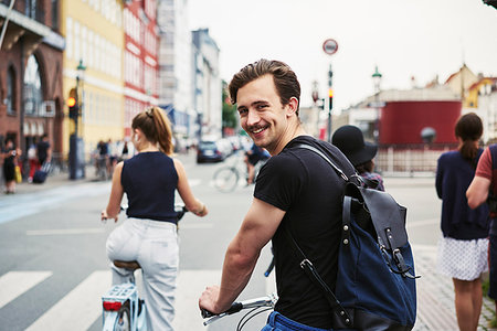 region hovedstaden - Young man riding a bicycle in Copenhagen, Denmark Foto de stock - Sin royalties Premium, Código: 6126-09204256