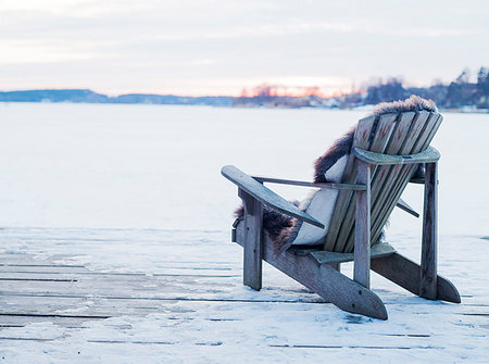 simsearch:6126-09266628,k - Wooden chair on deck in snow in Sigtuna, Sweden Stock Photo - Premium Royalty-Free, Code: 6126-09204331