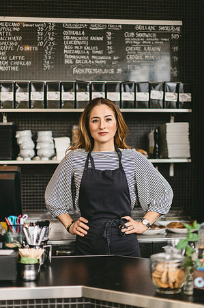 simsearch:6126-09204829,k - Portrait of barista behind counter in cafe Stock Photo - Premium Royalty-Free, Code: 6126-09204816