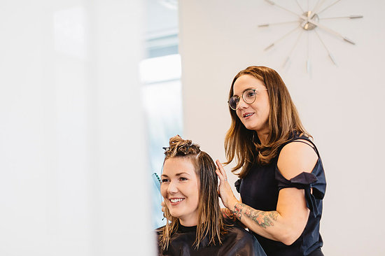 Hairdresser cutting clients hair in Sweden Stock Photo - Premium Royalty-Free, Image code: 6126-09204837