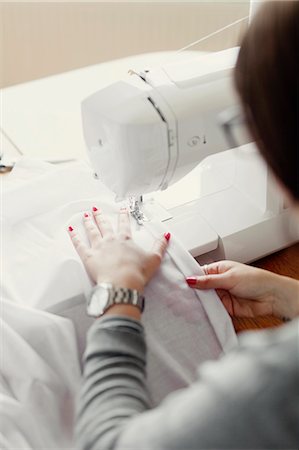 Person hand sewing Stock Photos - Page 1 : Masterfile