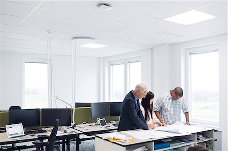 Architects and project managers working in office Stock Photo - Premium Royalty-Free, Code: 6127-09034957