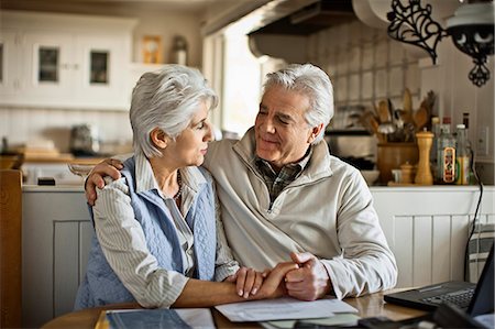 Mature couple working on their finances together. Stock Photo - Premium Royalty-Free, Code: 6128-08747754